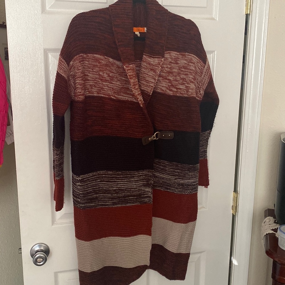 One A long brown/tan cardigan